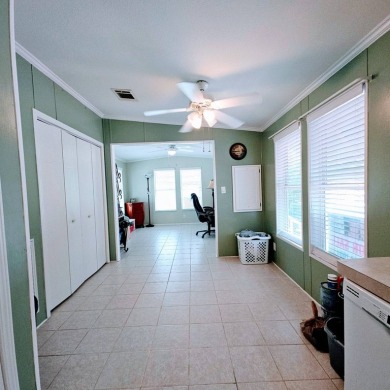 This one grabs your attention immediately as you approach the on Golden Lakes Golf Course in Florida - for sale on GolfHomes.com, golf home, golf lot