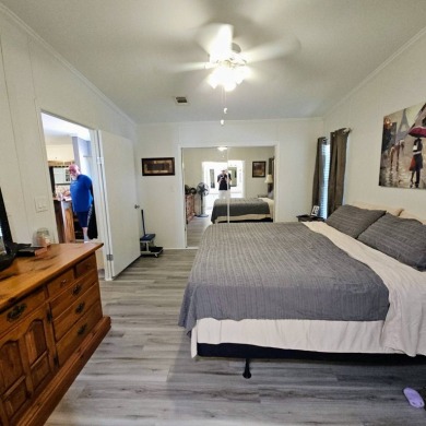 This one grabs your attention immediately as you approach the on Golden Lakes Golf Course in Florida - for sale on GolfHomes.com, golf home, golf lot