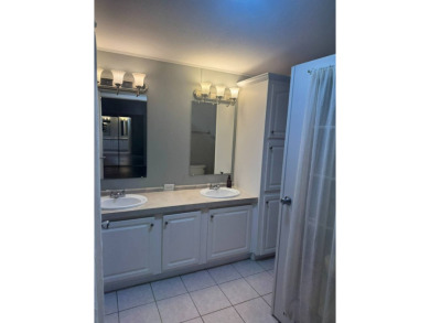 This one grabs your attention immediately as you approach the on Golden Lakes Golf Course in Florida - for sale on GolfHomes.com, golf home, golf lot