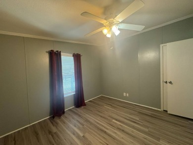 This one grabs your attention immediately as you approach the on Golden Lakes Golf Course in Florida - for sale on GolfHomes.com, golf home, golf lot