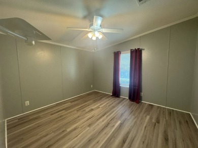 This one grabs your attention immediately as you approach the on Golden Lakes Golf Course in Florida - for sale on GolfHomes.com, golf home, golf lot