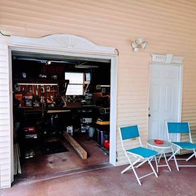 This one grabs your attention immediately as you approach the on Golden Lakes Golf Course in Florida - for sale on GolfHomes.com, golf home, golf lot