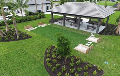 Welcome to luxurious living in the prestigious gated and guarded on Old Corkscrew Golf Club in Florida - for sale on GolfHomes.com, golf home, golf lot