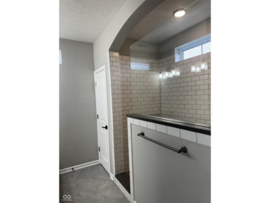 Discover the perfect blend of timeless charm and modern comfort on The Fort Golf Course in Indiana - for sale on GolfHomes.com, golf home, golf lot