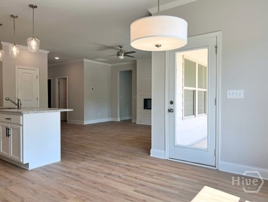 The Ellington Plan built by Stephen Elliott Homes. Quick on Chimney Oaks Golf Club in Georgia - for sale on GolfHomes.com, golf home, golf lot