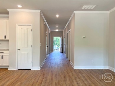 The Ellington Plan built by Stephen Elliott Homes. Quick on Chimney Oaks Golf Club in Georgia - for sale on GolfHomes.com, golf home, golf lot