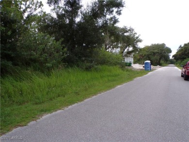 This lot is on a quiet street that would be a great place to on Sabal Trace Golf and Country Club in Florida - for sale on GolfHomes.com, golf home, golf lot