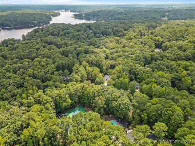Come tour this spacious 4-bedroom, 2-bathroom single story home on Carolina Trace Country Club in North Carolina - for sale on GolfHomes.com, golf home, golf lot