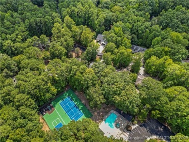 Come tour this spacious 4-bedroom, 2-bathroom single story home on Carolina Trace Country Club in North Carolina - for sale on GolfHomes.com, golf home, golf lot