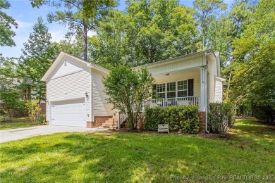 Come tour this spacious 4-bedroom, 2-bathroom single story home on Carolina Trace Country Club in North Carolina - for sale on GolfHomes.com, golf home, golf lot