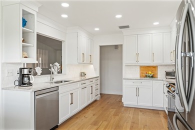 LOCATION! Rare setting on near HALF-ACRE lot. EAST OF US1! GOLF on The American Golf Club in Florida - for sale on GolfHomes.com, golf home, golf lot