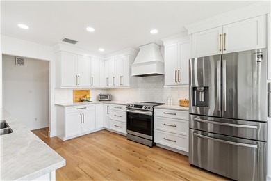 LOCATION! Rare setting on near HALF-ACRE lot. EAST OF US1! GOLF on The American Golf Club in Florida - for sale on GolfHomes.com, golf home, golf lot