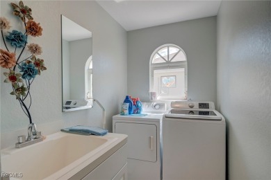 This charming, well-maintained, 3 bedroom/2 bath home, checks on Royal Tee Country Club in Florida - for sale on GolfHomes.com, golf home, golf lot