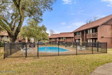 Discover the charm of this inviting 1-bedroom, 1-bath upstairs on Diamondhead Country Club in Mississippi - for sale on GolfHomes.com, golf home, golf lot