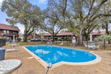 Discover the charm of this inviting 1-bedroom, 1-bath upstairs on Diamondhead Country Club in Mississippi - for sale on GolfHomes.com, golf home, golf lot