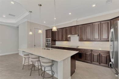 Prepare to be impressed by this beautifully upgraded golf home on Sarasota National Golf Club in Florida - for sale on GolfHomes.com, golf home, golf lot