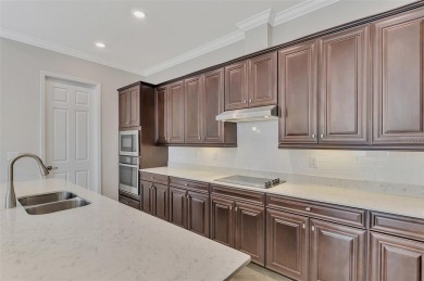 Prepare to be impressed by this beautifully upgraded golf home on Sarasota National Golf Club in Florida - for sale on GolfHomes.com, golf home, golf lot