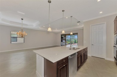 Prepare to be impressed by this beautifully upgraded golf home on Sarasota National Golf Club in Florida - for sale on GolfHomes.com, golf home, golf lot