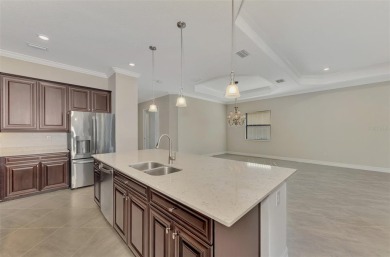 Prepare to be impressed by this beautifully upgraded golf home on Sarasota National Golf Club in Florida - for sale on GolfHomes.com, golf home, golf lot