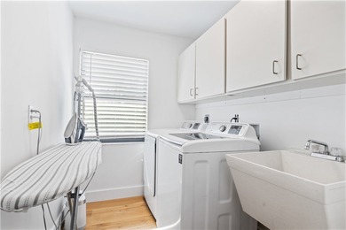 LOCATION! Rare setting on near HALF-ACRE lot. EAST OF US1! GOLF on The American Golf Club in Florida - for sale on GolfHomes.com, golf home, golf lot