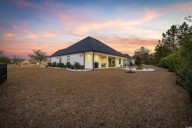 Luxurious custom built craftsman style home located in desirable on Wild Wing Plantation in South Carolina - for sale on GolfHomes.com, golf home, golf lot