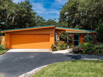 This Beachy Bungalow is nestled in the heart of Vero's Central on Riomar Country Club in Florida - for sale on GolfHomes.com, golf home, golf lot