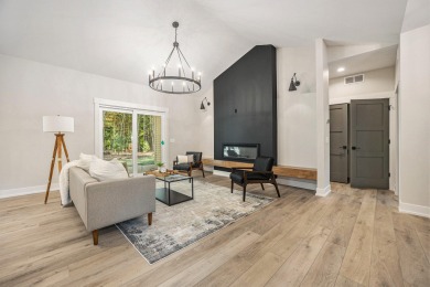 Discover your dream home with effortless living and modern on Oak Ridge Golf Club in Michigan - for sale on GolfHomes.com, golf home, golf lot