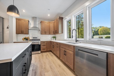 Discover your dream home with effortless living and modern on Oak Ridge Golf Club in Michigan - for sale on GolfHomes.com, golf home, golf lot