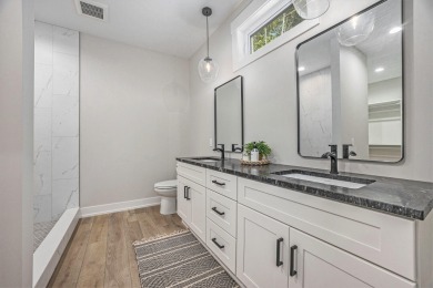 Discover your dream home with effortless living and modern on Oak Ridge Golf Club in Michigan - for sale on GolfHomes.com, golf home, golf lot