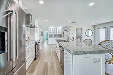 Welcome to 1073 Sand Castle Rd -- a fully renovated on The Dunes Golf and Tennis Club in Florida - for sale on GolfHomes.com, golf home, golf lot