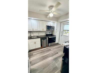 Stunning Corner Condo in the Heart of Pompano Beach! Step into on Palm-Aire Country Club and Resort - Palms in Florida - for sale on GolfHomes.com, golf home, golf lot