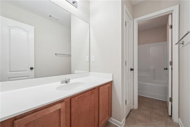 Welcome to this charming and fully renovated 4-bedroom, 2.5-bath on Chateau Elan Golf Club  in Georgia - for sale on GolfHomes.com, golf home, golf lot