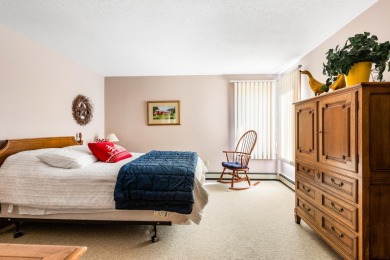 Eastman condo with 3 levels of living space and beautiful sunset on Eastman Golf Links in New Hampshire - for sale on GolfHomes.com, golf home, golf lot