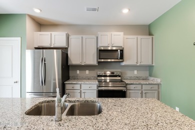 Welcome to your next chapter at 1620 Lightered Knot Ct SE--a on Lennon Hills Golf Course in North Carolina - for sale on GolfHomes.com, golf home, golf lot