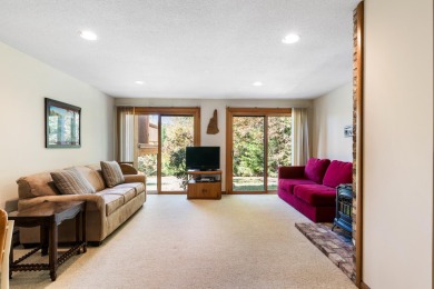 Eastman condo with 3 levels of living space and beautiful sunset on Eastman Golf Links in New Hampshire - for sale on GolfHomes.com, golf home, golf lot