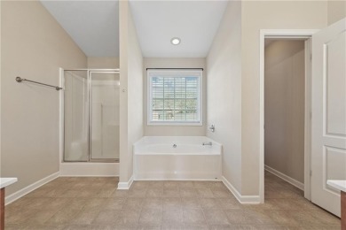 Welcome to this charming and fully renovated 4-bedroom, 2.5-bath on Chateau Elan Golf Club  in Georgia - for sale on GolfHomes.com, golf home, golf lot
