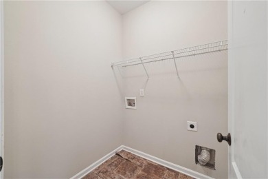 Welcome to this charming and fully renovated 4-bedroom, 2.5-bath on Chateau Elan Golf Club  in Georgia - for sale on GolfHomes.com, golf home, golf lot