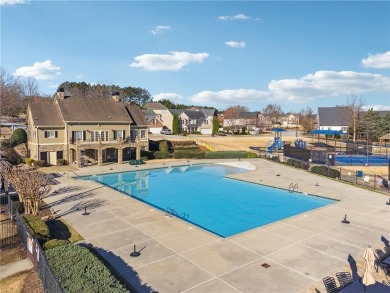 Welcome to this charming and fully renovated 4-bedroom, 2.5-bath on Chateau Elan Golf Club  in Georgia - for sale on GolfHomes.com, golf home, golf lot