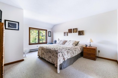 Eastman condo with 3 levels of living space and beautiful sunset on Eastman Golf Links in New Hampshire - for sale on GolfHomes.com, golf home, golf lot