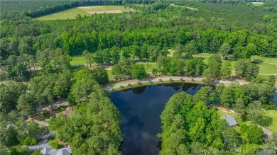 THREE BEDROOM SEPTIC* This captivating, lake-front home features on Whispering Pines Golf Course in North Carolina - for sale on GolfHomes.com, golf home, golf lot