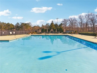 Welcome to this charming and fully renovated 4-bedroom, 2.5-bath on Chateau Elan Golf Club  in Georgia - for sale on GolfHomes.com, golf home, golf lot