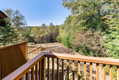 Eastman condo with 3 levels of living space and beautiful sunset on Eastman Golf Links in New Hampshire - for sale on GolfHomes.com, golf home, golf lot