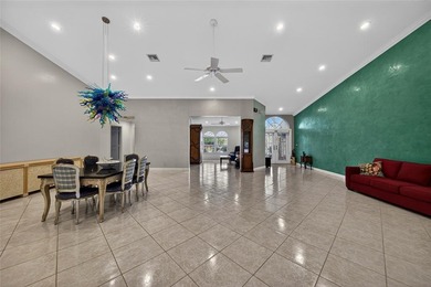 Casual elegance is evident the moment you enter this stunning on Boca Greens Country Club in Florida - for sale on GolfHomes.com, golf home, golf lot