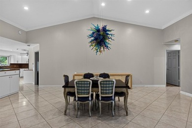 Casual elegance is evident the moment you enter this stunning on Boca Greens Country Club in Florida - for sale on GolfHomes.com, golf home, golf lot