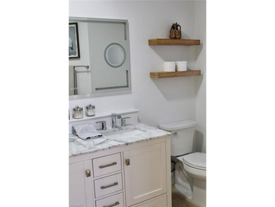 Totally updated property...! This home has been meticulously on The Colony Golf and Country Club in Florida - for sale on GolfHomes.com, golf home, golf lot