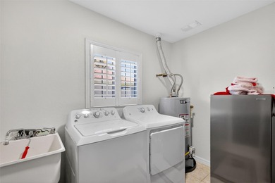 Well-maintained and updated Extended Palm II model in Del Webb on Eagle Ridge At Spruce Creek Country Club in Florida - for sale on GolfHomes.com, golf home, golf lot