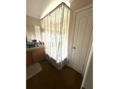 Welcome to Your Spacious Triple-Wide Retreat with Pond Views! on Schalamar Creek Golf and Country Club in Florida - for sale on GolfHomes.com, golf home, golf lot