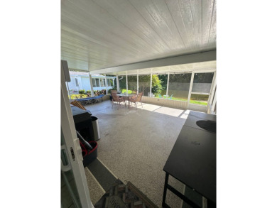 Welcome to Your Spacious Triple-Wide Retreat with Pond Views! on Schalamar Creek Golf and Country Club in Florida - for sale on GolfHomes.com, golf home, golf lot