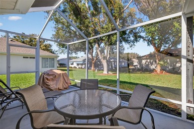 Well-maintained and updated Extended Palm II model in Del Webb on Eagle Ridge At Spruce Creek Country Club in Florida - for sale on GolfHomes.com, golf home, golf lot