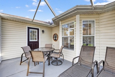 Well-maintained and updated Extended Palm II model in Del Webb on Eagle Ridge At Spruce Creek Country Club in Florida - for sale on GolfHomes.com, golf home, golf lot